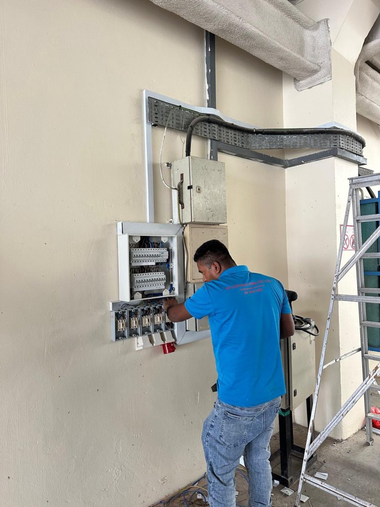 VF Contractors electrician installing a distribution board