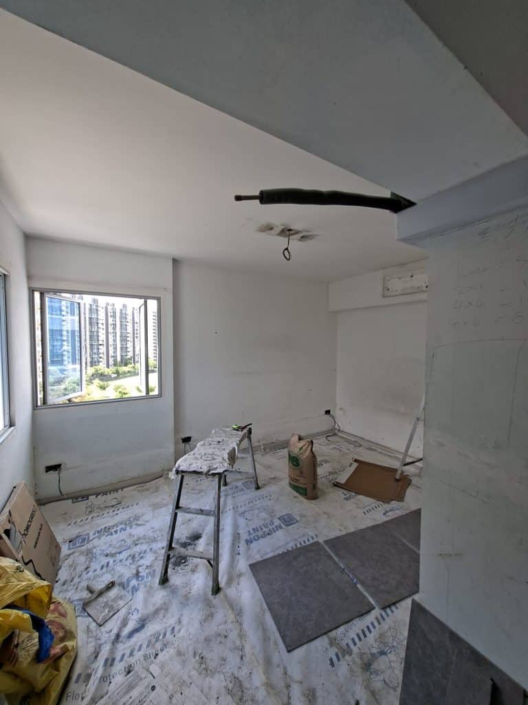 HDB room during rewiring with new ceiling cables